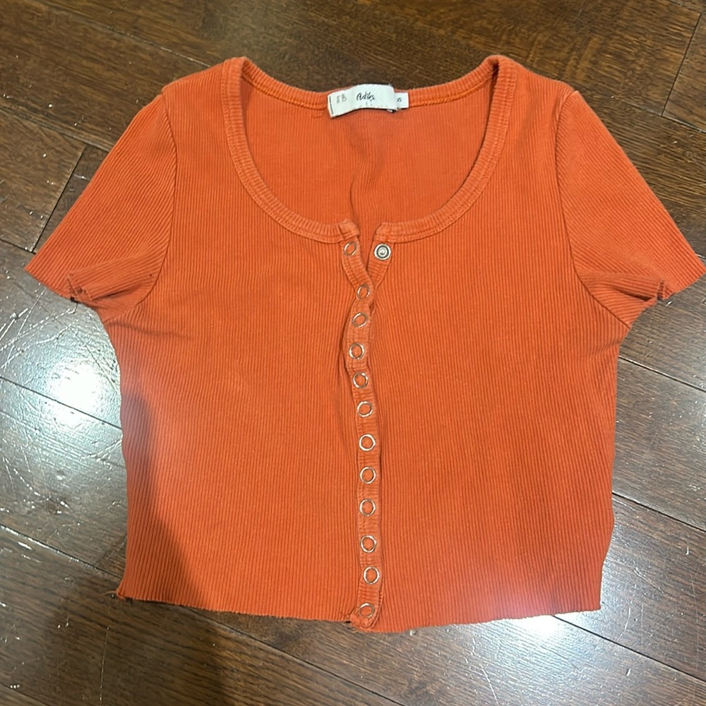 orange tee shirt from adika